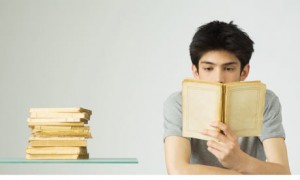 Young-man-reading-a-book-001